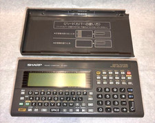 Ordinateur de poche SHARP PC-G801 PokeCon langue C fonctionnel testé du JAPON...