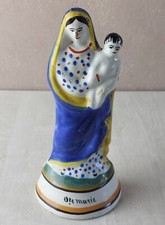 Ancienne statue en céramique