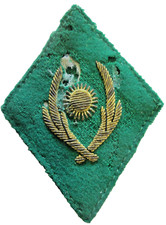 Ecusson  soleil + feuillages brodés  or / fond vert - non identifié - Afrique ?