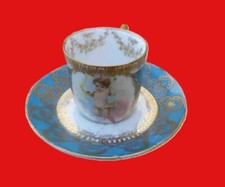 Tasse et sous tasse en porcelaine de VIENNE.