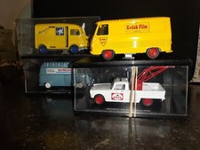 Lot de 4 Camions par ELIGOR : 1 Citroën, 2 Peugeot, 1 Renault.