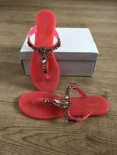 Claquettes roses fluo neuves