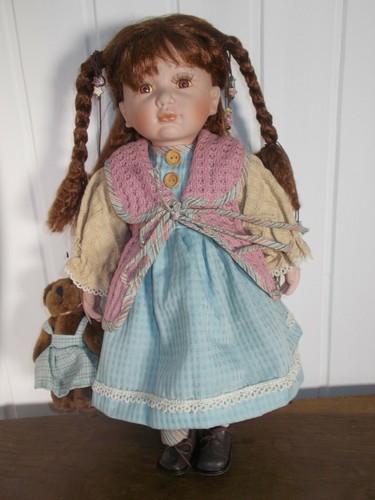 Poupée tête porcelaine