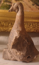 Tuile Zoomorphe figurant une