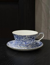 Tasse et sous-tasse en