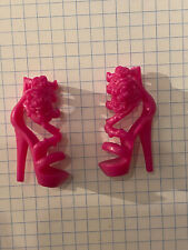 PAIRE DE CHAUSSURES ROSE POUR