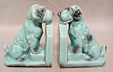 Jolie paire de serre-livres en