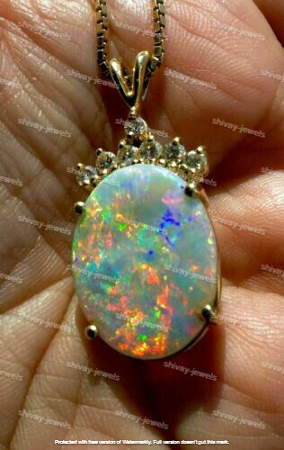 Real fire opal 00ctw oval - fire, 2.00ctw