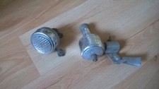 Une ancienne sonnette et dynamo LUXOR de vélo