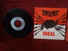 TRUST " Idéal / Toutes Barricades " 45 tours France 1983 label gris rare.