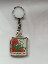 ANCIEN PORTE CLE BOURBON PUBLICITAIRE CAHIER HERAKLES