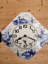 Pendule horloge faïence decor