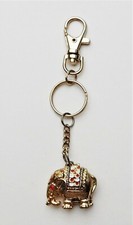 Porte clés doré + strass éléphant boitier s'ouvrant sur le dessus /03