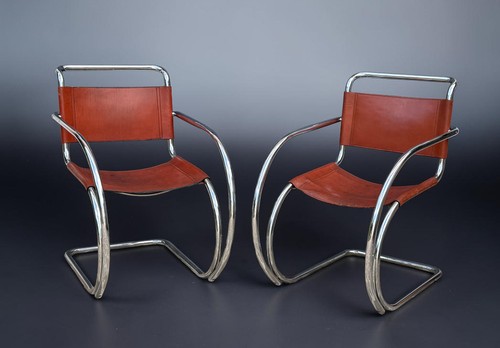 Paire fauteuils cuir et - de,