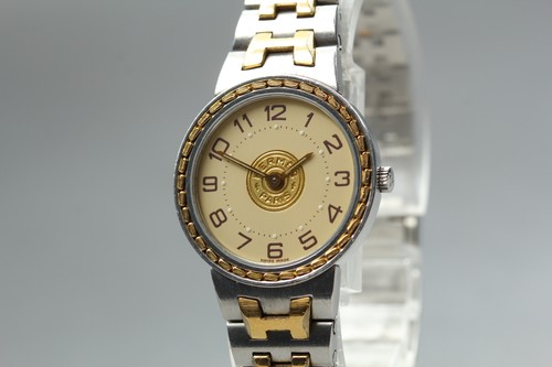 Presque comme neuve montre - [presque,