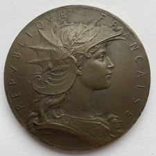 Médaille en bronze signée