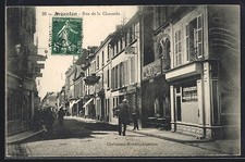 CPA Argentan, Rue de la Chaussée, vue de la rue avec commercesn 1910 