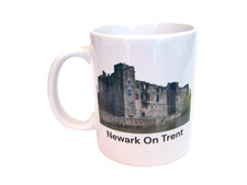 Souvenir ceramic mug of - a,