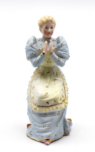 Ancienne figurine femme assise