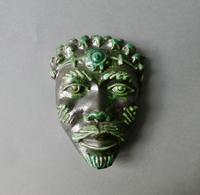 rare masque en céramique