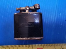 Briquet essence ancien  système " à bras levé" FLERTEX ?. EB 010-A