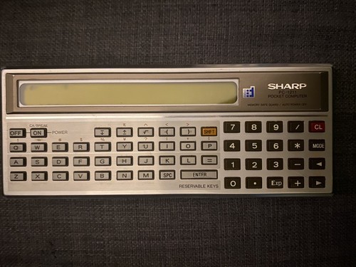 Sharp 1211 pocket computer - sharp, pc-1211