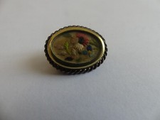 BOUTON OVALE EN METAL DORE