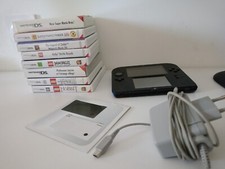 3 Ds bleu + 8 jeux ( Zelda