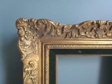 Cadre en bois et stuc Doré