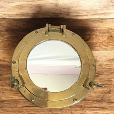 Miroir hublot en laiton.