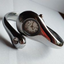 Montre femme MELODY  quartz bracelet rigide décor strass  pile incluse