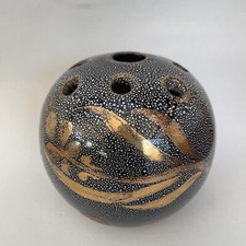 Céramique, pique fleurs