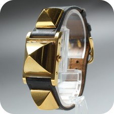 Montre pour femme vintage HERMES Medor ceinture noire dorée à quartz...