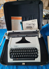 VINTAGE MACHINE A ECRIRE PORTABLE MARQUE ERIKA  GRAND CHARIOT FONCTIONNELLE