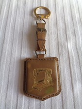 ANCIEN PORTE CLE CUIR  MACHINE A COUDRE PFAFF LA FAVORITE J. GIRARD LE HAVRE