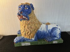 Lion en faience fine de Saint