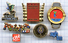 Lot divers Pin's ARTHUS BERTRAND AB Montre Watch GOLF TF1 RIVIERA ST MICHEL etc