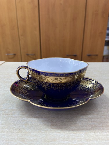 Ancien déjeuner une tasse - une,