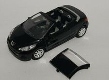 Norev 3 inches 1/60.  Peugeot 207 cc mk2 Roland Garros noire .  Neuf en boite 