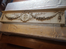 Cantonnière style Louis XVI en bois  à décor de puttis et fleurs