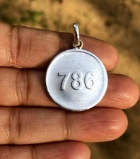 Pendentif pièce de monnaie en