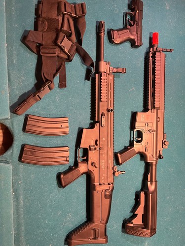 Airsoft gun scar - a, and