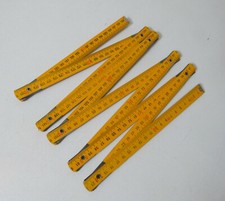 ancien mètre pliant en bois jaune 200cm