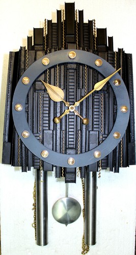 Rare pendule murale métal - rare,