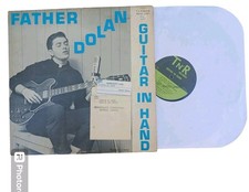 Father Dolan Guitar In Hand