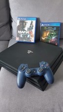 PlayStation 4 Pro + Manette + 2 jeux