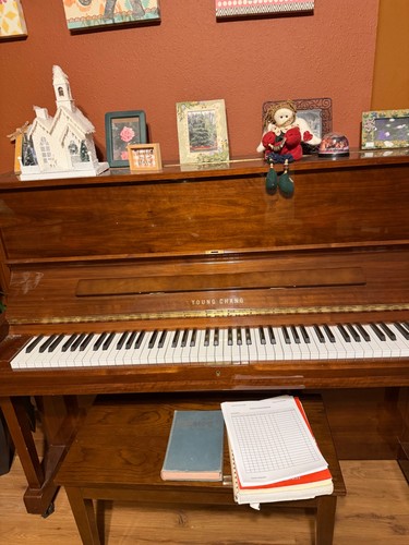 Piano upright was at - was,