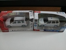 Dacia duster blanc/duster police  mondo motors  1/43