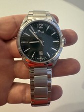 montre lotus homme