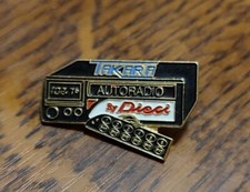 Pin's ancien rare AUTORADIO TAKARA by Dieci